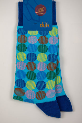 Zilas zeķes ar krāsainu apļu rakstu