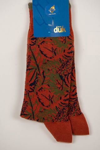 Rust brown socks with a floral pattern
