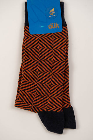 Tumši zilas zeķes ar oranžu rakstu