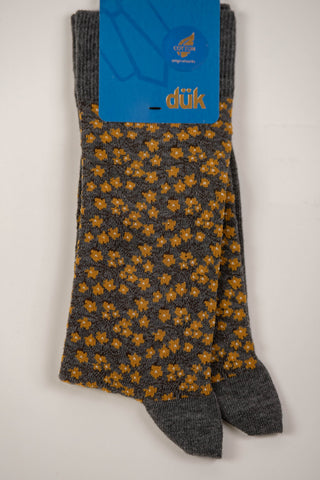 Gray socks with a pattern of yellow flowers