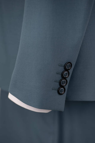 Turquoise blue Quesste slim fit suit with a vest