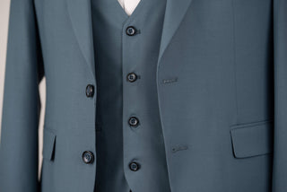 Turquoise blue Quesste slim fit suit with a vest