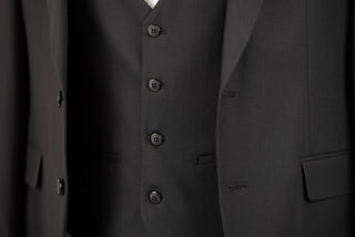 Black Quesste slim fit suit with a vest
