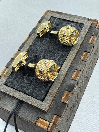 Gold cufflinks with stones