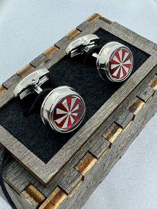 Silver cufflinks with red ornaments